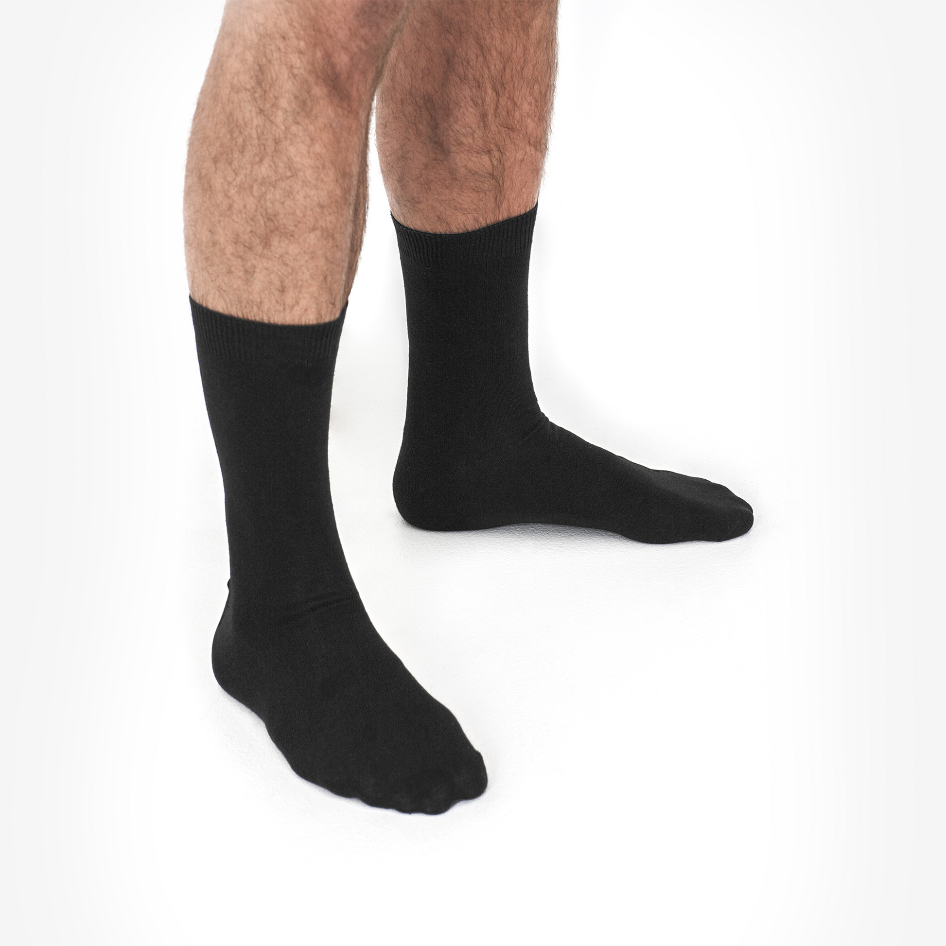 Main Copenhagen sorte strømper – komfortable, diskrete og perfekte til både business og hverdag.