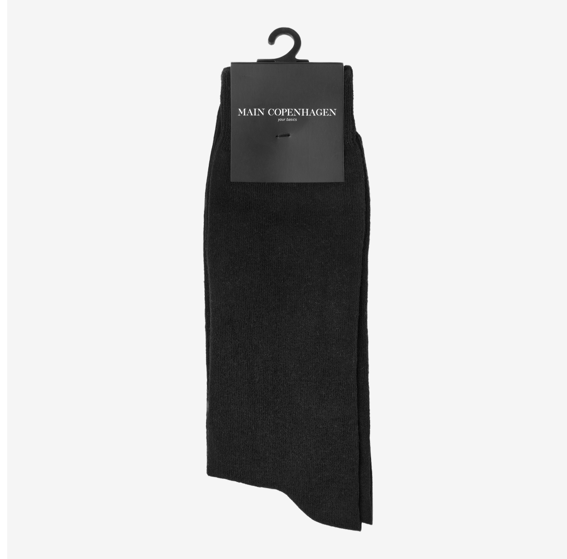 Main Copenhagen strømper i sort – klassiske, bløde og designet til maksimal komfort hele dagen.
